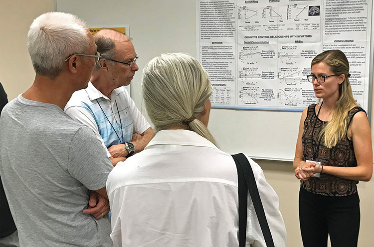 Classes are only one of the benefits of membership. Here, Melissa Walsh (right) from ASU describes her research on aging.