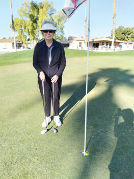 Pictured is Joan Seaman after getting a hole-in-one.