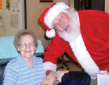 Santa visits a client of Neighbors Who Care!