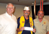 Lions Club members Garner and Sully with Commander Peer