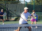 Rick Kenny displays his volley form during the club’s clinic/mixer.