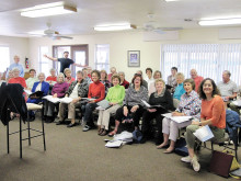 Members of the choirs of the Christian churches and Jewish congregation meet for the first rehearsal of their interdenominational choir for the Sun Lakes Choir Festival.