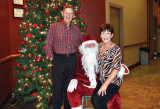 Pictured is the 2015 President of the Tennis Club, Dave Walden. and the new Vice-President, Jen Walden with the great looking Santa (Larry Buehler).