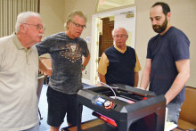 Bryan Beata, President of the Apple Users Group of Sun Lakes on the right, demonstrated 3D printing at last month’s meeting.