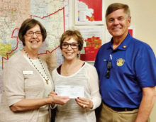 Pictured are Rotarians Terrie Sanders and Steve Perkins presenting a $1,030 check to Ginny Hildebrand, the CEO/President of the United Food Bank. The presentation was made April 7 at Food Bank headquarters in Mesa.