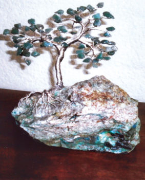 A memorial jade Ming tree; Lapidary Club member Chet Howe created this Ming Tree using jade stones for the leaves on a base of green kryptonite as a memorial gift for the family of long-time club member Violet Williams.