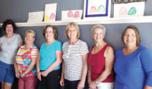 Displayed on the shelf above their heads are the first paintings done by new watercolor artists. Cindy Cisco on the far left had joined the class that day working on another project that isn’t pictured. To the right of Cindy are Jean Mitchel, Judy Ramberger, Sonia Sjurseth, Jean Pritchert and Carolyn Hanson.