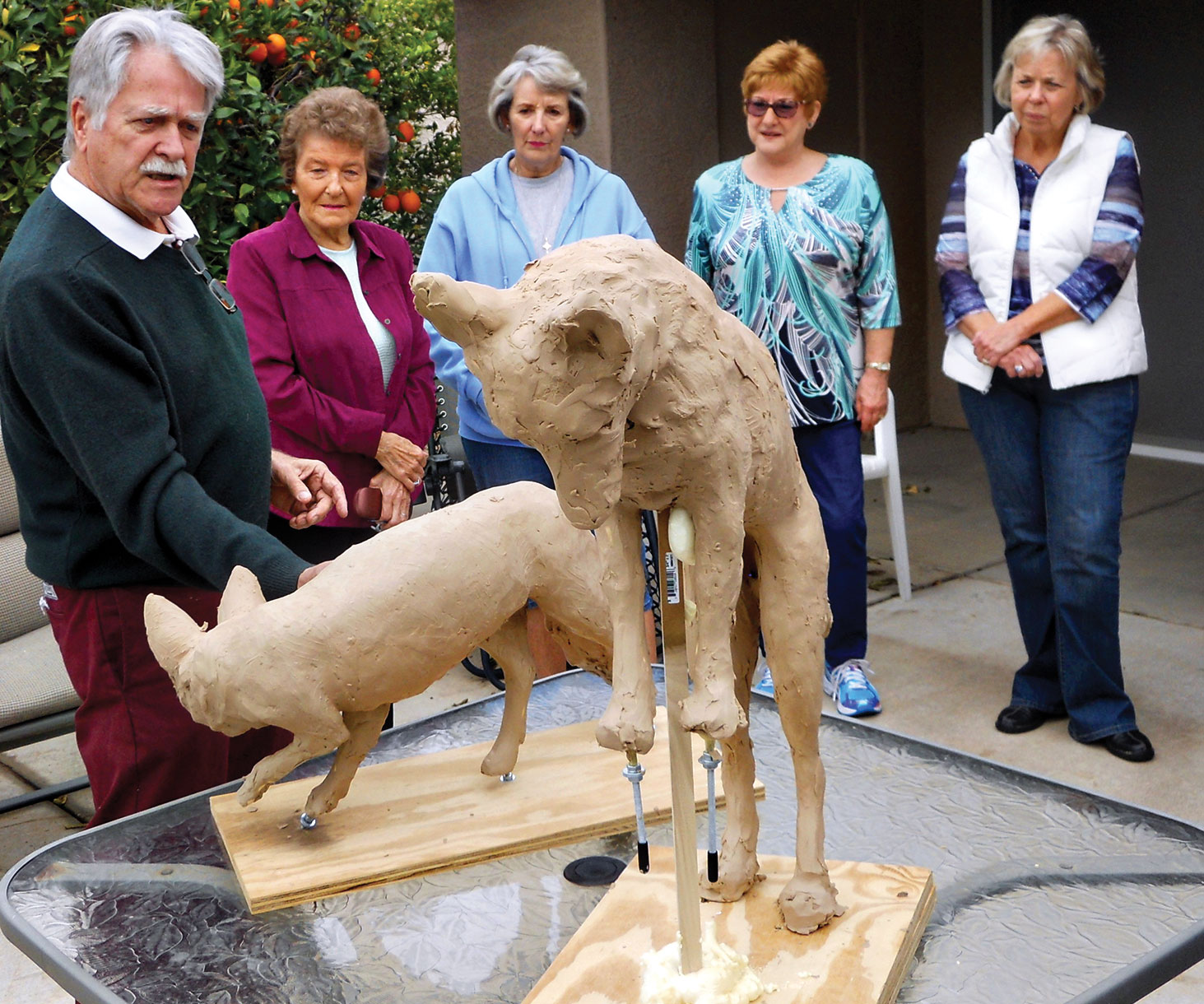 SunBird resident and professional sculptor Art Norby discusses the process of creating a bronze statue with members of the Lapidary Club.