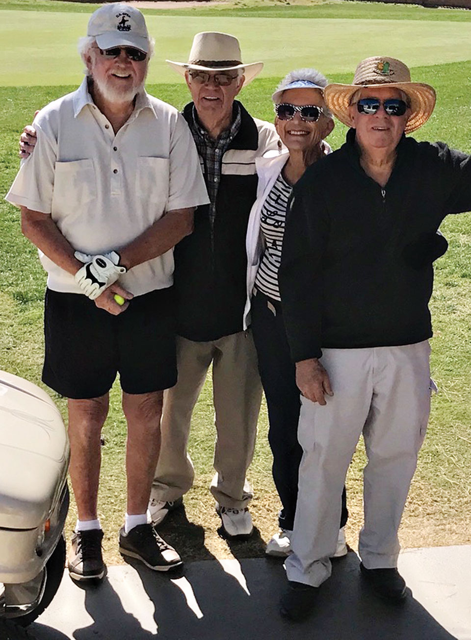 Rich VanderVeen, Chet Howe, Rosie VanderVeen and Dave Meyers at Kare Bears Golf Tournament