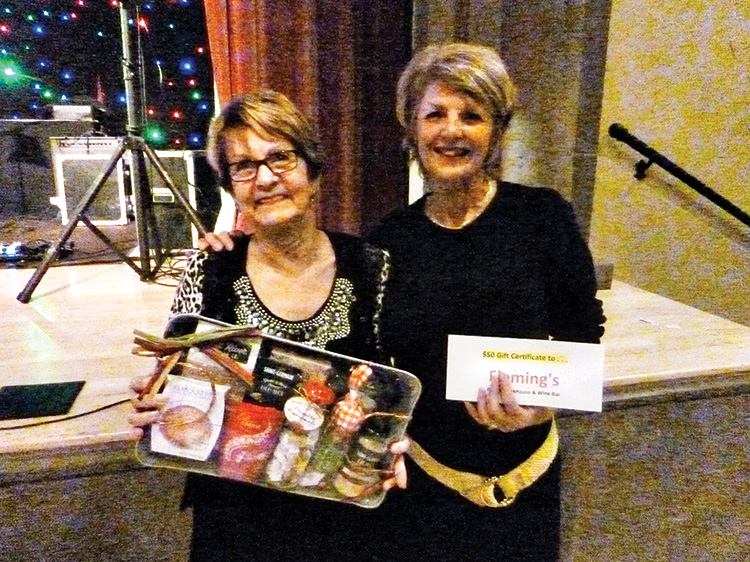 April’s door prize winners (left to right): Idhidey Hunter (not pictured), Lynn Story, Barb Green