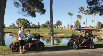 Golf carts practicing social distancing (six feet apart)