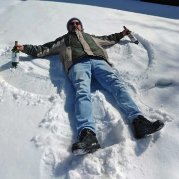 Joe Gann making snow angels with a couple of "friends" in Calgary, while waiting for the border to reopen