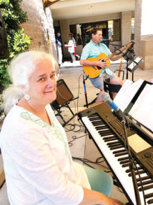 Kim and Mike Hanson share their musical talent as two of three directors of the SunBird Singers and Ringers. An audience member said, “I enjoyed this concert more than any I’ve ever attended!” Here they entertain on the patio. They also assist with the SunBird Community Church.