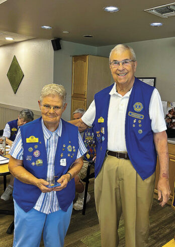 Joan Bruening (left) was presented the Presidents Award.